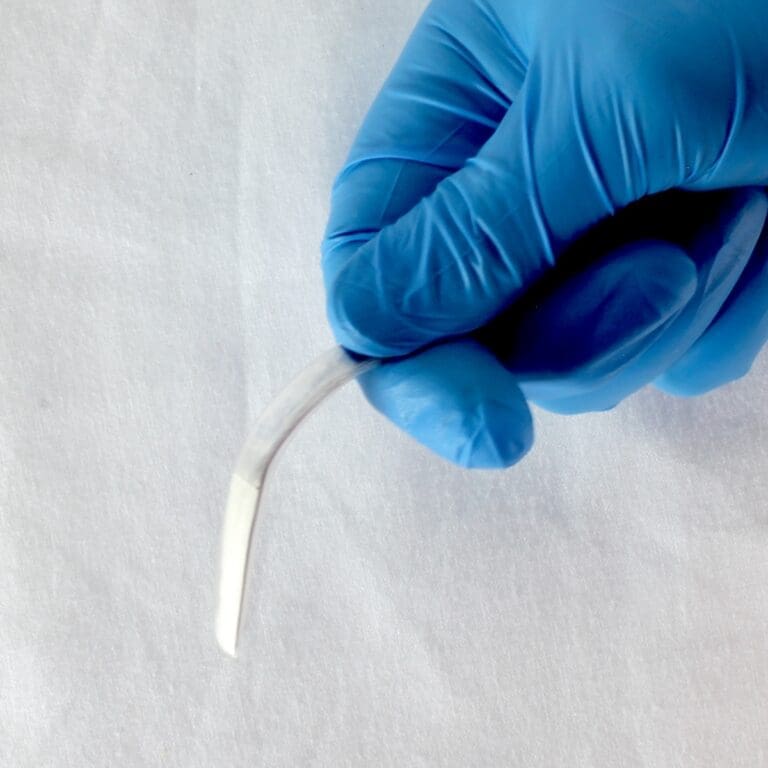 Single-use LightMat providing surgical retractor lighting in cavity